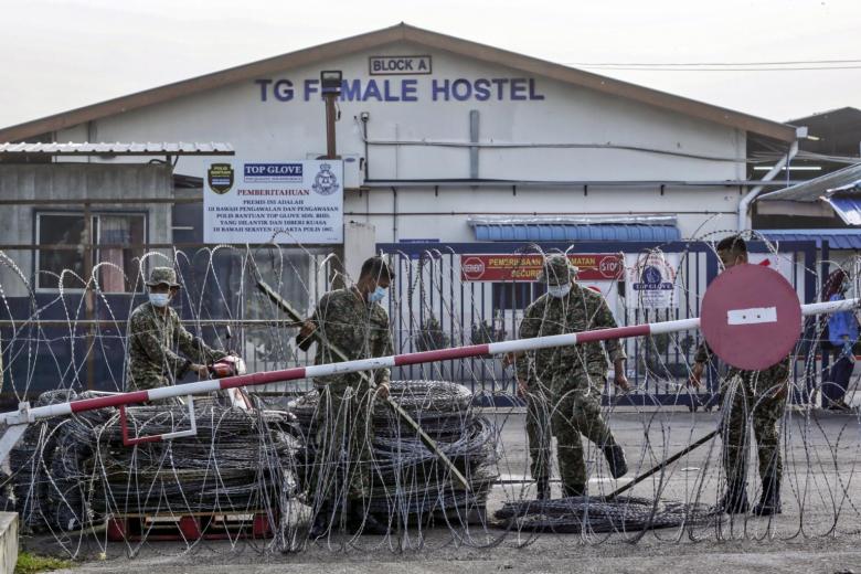 Malaysia orders full probe on Top Glove's work and housing condition