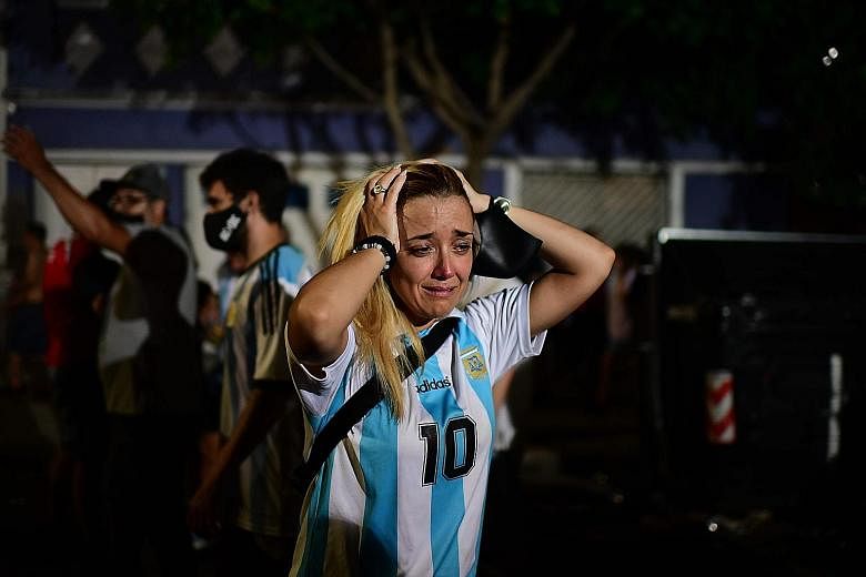 Above: A Maradona fan in tears as she and other fans gathered at Diego Armando Maradona Stadium in Buenos Aires to pay homage to the soccer legend on Wednesday. Right: Above: Maradona with his doctor Leopoldo Luque in a photograph taken on Nov 11 in 