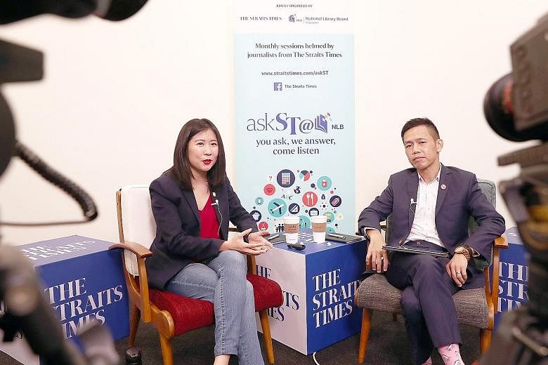 Straits Times travel correspondent Clara Lock and Singapore Tourism Board chief executive Keith Tan at askST@NLB's second November session. Mr Tan hopes that Singaporeans will "take the time to slow down, step out and be proud of this beautiful littl
