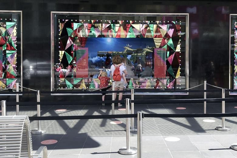 A festive window display at a Myer department store in Melbourne on Wednesday. From this week, residents in Melbourne, Australia's second-largest city, are no longer required to wear masks outdoors. PHOTO: BLOOMBERG