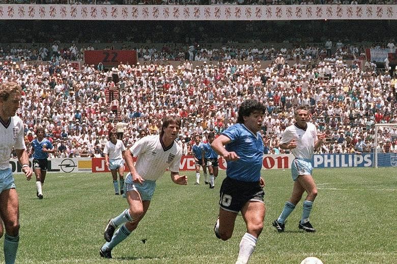 Diego Maradona on a dazzling run in which he went past six English players to put Argentina 2-0 up in their 1986 World Cup quarter-final in Mexico City. He had earlier cheated in scoring the "Hand of God" goal. The team eventually won their second ti