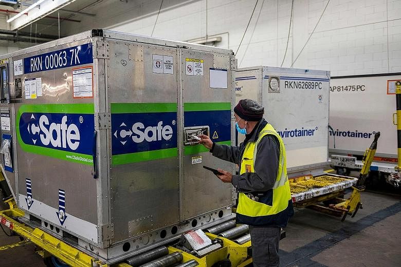 A worker checking a temperature-controlled container at Lufthansa Cargo's pharmaceutical hub in Frankfurt Airport last week.