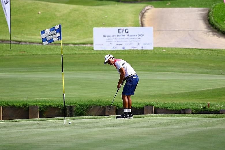Brandon Han putting at the EFG Singapore Junior Masters at Laguna's Masters Course. As part of Covid-19 measures, golfers are not allowed to remove the flagsticks.