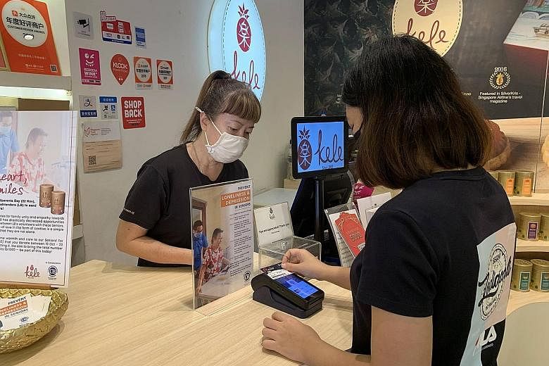 Lions Befrienders has partnered GivePls to set up over 30 contactless donation terminals, located at outlets such as Kele. PHOTO: LIONS BEFRIENDERS