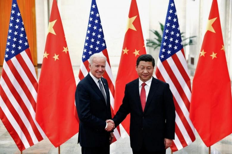 Biden says he won't immediately remove U.S. tariffs on China