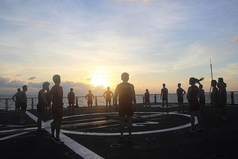 Midshipmen doing their daily fitness regime on board the RSS Endeavour during their 20-day training deployment from Nov 9 to 29. PHOTO: MINISTRY OF DEFENCE