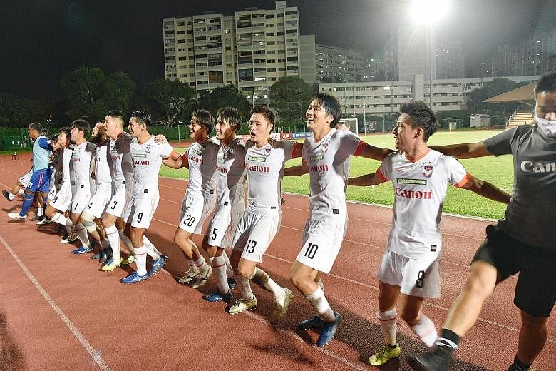 Albirex Niigata celebrating after winning the SPL title yesterday. Their nearest challengers, Tampines, could only draw 1-1 with Geylang International Ryoya Taniguchi is all smiles after sending the ball beyond Hougang's goalkeeper Ridhuan Barudin in