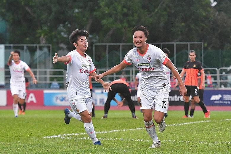 Albirex Niigata celebrating after winning the SPL title yesterday. Their nearest challengers, Tampines, could only draw 1-1 with Geylang International Ryoya Taniguchi is all smiles after sending the ball beyond Hougang's goalkeeper Ridhuan Barudin in