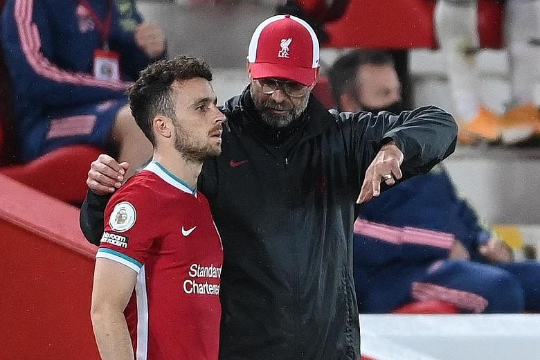 Liverpool forward Diogo Jota has credited manager Jurgen Klopp for helping him to settle at Anfield following a £41 million (S$73.5 million) move from Wolves in September. PHOTO: REUTERS