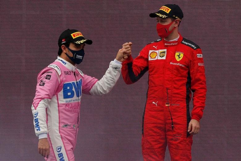 Ferrari's Sebastian Vettel fist-bumping Sergio Perez (left) at the Turkish Grand Prix on Nov 15. That was Vettel's only podium finish this season.