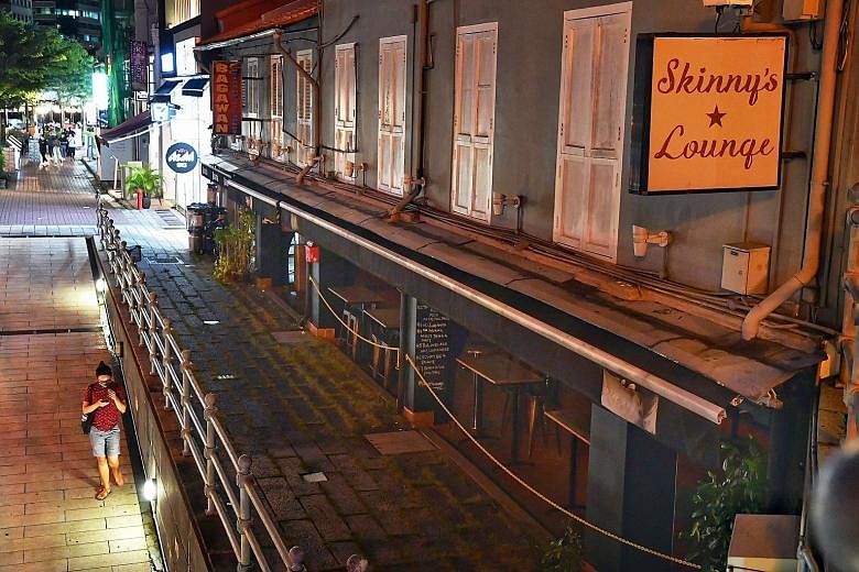 Dive bar Skinny's Lounge (right) at Boat Quay is set to reopen today, while Bar Kiharu (below) at Orchard Plaza, which has been closed for eight months, is reopening this week. PHOTOS: CHONG JUN LIANG, BAR KIHARU/ FACEBOOK