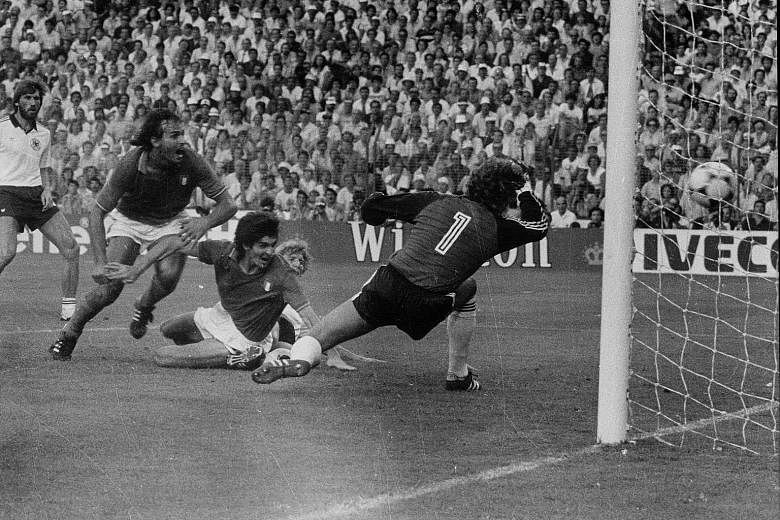 Italian Football Federation president Gabriele Gravina describes Paolo Rossi (left) as one who was "indelibly linked to the blue shirt and his style of play inspired many strikers of future generations". Below: Rossi scoring the opening goal for Ital