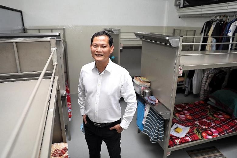 Mr Tung Yui Fai, chief of the Assurance, Care and Engagement (Ace) Group under the Ministry Of Manpower, at Chye Heng Huat Engineering's factory-converted dormitory yesterday. Ace Group is working with its partners on the issue of new housing standar