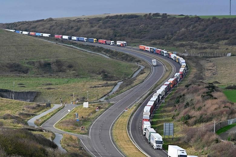 A long line of lorries carrying freight heading to the port of Dover on England's south coast on Thursday. Lorries were backed up to prevent the port from becoming overwhelmed.