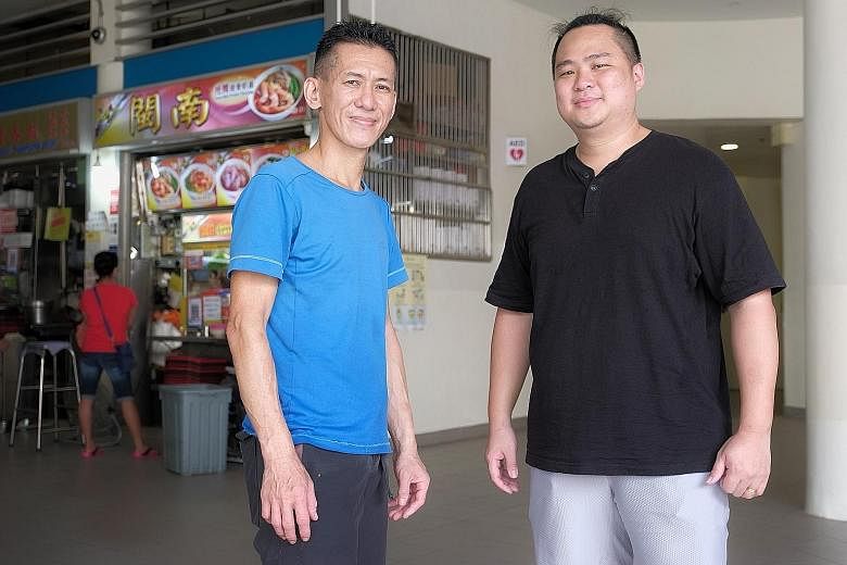 Top and above: Mr Tan Kin Leng (in blue), who runs Min Nan Pork Ribs Prawn Noodle stall at Tiong Bahru Food Centre, is mentoring Mr Lim Min Jie, who wants to start his own braised food stall. ST PHOTOS: GAVIN FOO