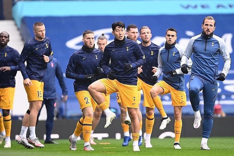 Son Heung-min, Harry Kane and teammates warming up before a game last month. They have combined for 18 Tottenham goals so far this season. PHOTO: REUTERS