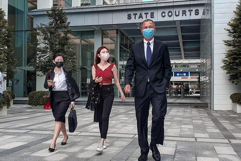 Blogger Vaune Phan (centre), flanked by her lawyers Cherisse Foo and Suresh Divyanathan, on Tuesday. After a trial, the court found that the social media personality had been defamed by Mr Mark Yeow last year.