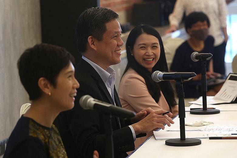 (From left) Manpower Minister Josephine Teo, Trade and Industry Minister Chan Chun Sing and the Monetary Authority of Singapore's Ms Thong Leng Yeng speaking to the media during a visit to United Overseas Bank yesterday.