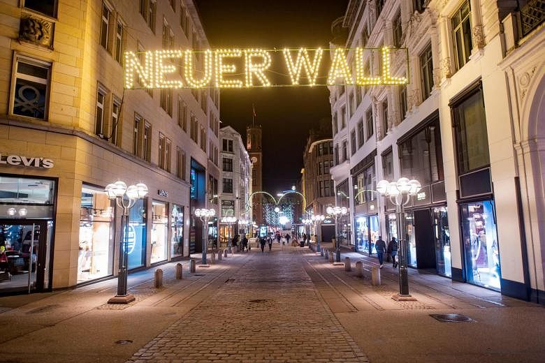 A near-empty Neuer Wall shopping street in Hamburg last Friday. Germany went into a light lockdown last month, hoping this would curb the spread of the coronavirus while pre-empting stricter measures. It did not do the trick, and a rigid lockdown was
