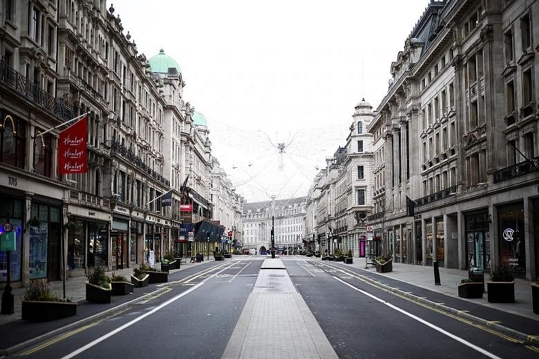 Shops in London's Regent Street that were closed yesterday amid curbs to stem the spread of the coronavirus. Early analysis of the mutated strain found in Britain suggests it may be as much as 70 per cent more transmissible than other circulating str