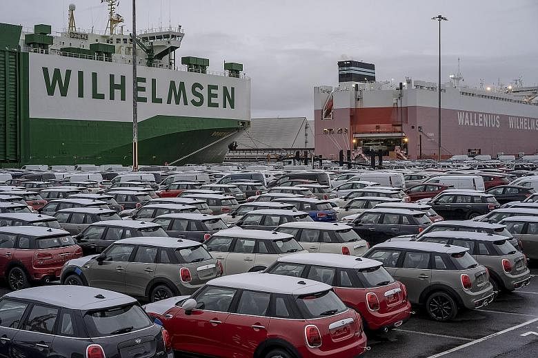 Trinity College in the University of Cambridge. EU students will have to pay steeper tuition fees at UK's prestigious universities. PHOTO: AGENCE FRANCE-PRESSE Cars ready for export in Bristol. With the deal, there will be no tariffs or quotas on goo