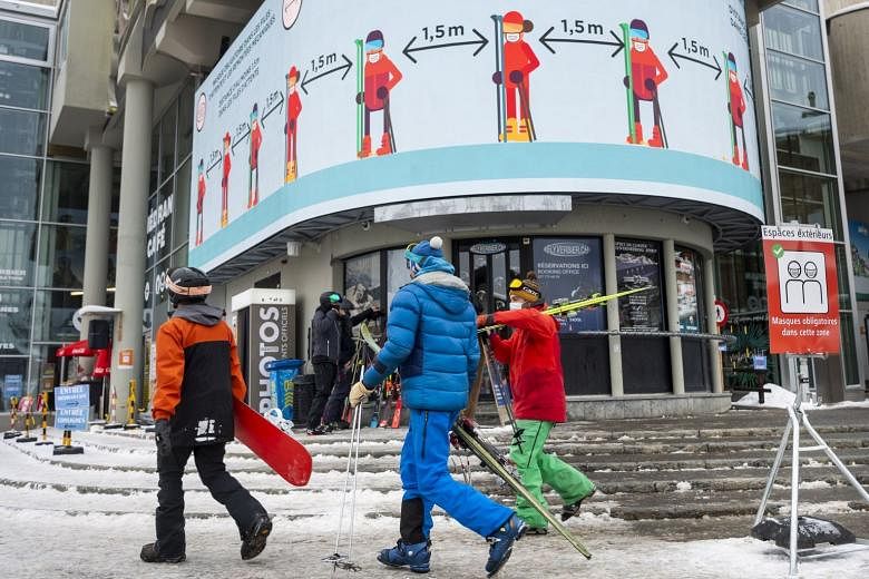 Around 200 quarantined British tourists sneak out of Swiss ski resort | The  Straits Times