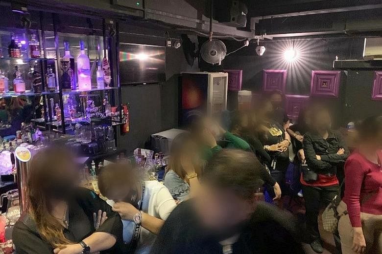 Large groups of patrons were found to be crowding together and consuming alcohol just after midnight at MZS Family Karaoke - which was open as an F&B outlet - in Cuscaden Road.