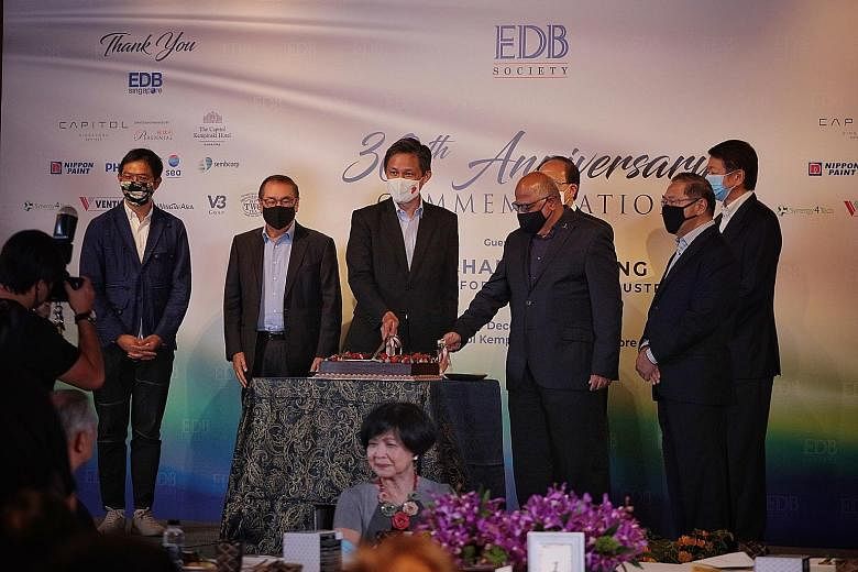 At the Economic Development Board Society's 30th anniversary event at the Capitol Kempinski Hotel yesterday were (from left) EDB managing director Chng Kai Fong, DBS Group Holdings chairman Peter Seah, Trade and Industry Minister Chan Chun Sing, EDB 