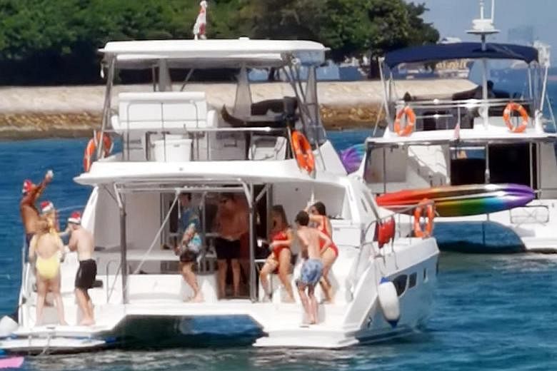 This screengrab from a video taken last Saturday showed a group of 10 people in close proximity on a yacht near Lazarus Island.