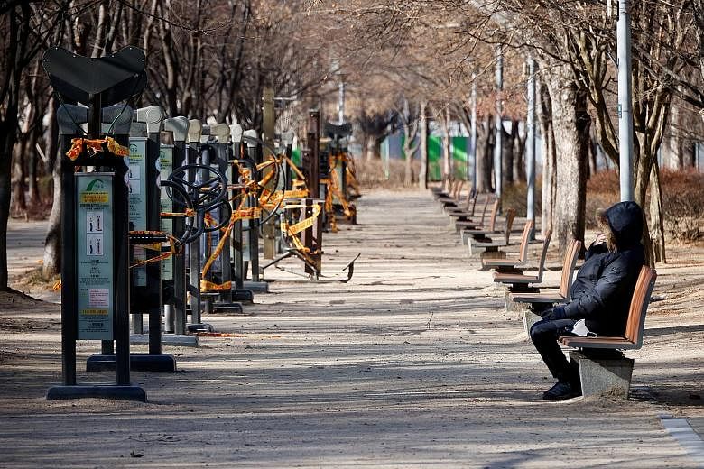 An outdoor gym in Seoul that has been cordoned off for use as part of measures to curb the spread of the coronavirus. At least 486 of South Korea's 900 reported Covid-19 deaths were of people over the age of 80. PHOTO: REUTERS