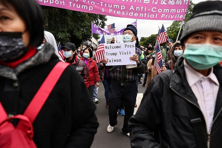 Supporters of Taiwanese independence rallying in Taipei yesterday in support of outgoing US President Donald Trump. PHOTO: REUTERS