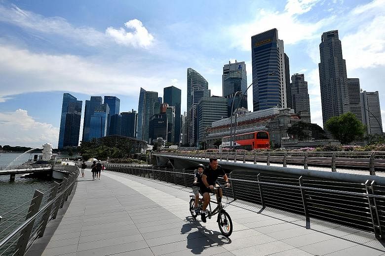 While the recession wreaked havoc across the economy and wiped out thousands of jobs, Singapore's success in containing Covid-19 and the lifting of curbs in the final two quarters helped ease the growth slump. ST PHOTO: LIM YAOHUI