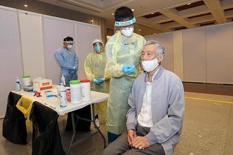 Prime Minister Lee Hsien Loong took a rapid Covid-19 test before yesterday's Parliament sitting, writing in a Facebook post: "It was quick and painless." He added that such testing will become a regular occurrence now that Singapore is in phase three