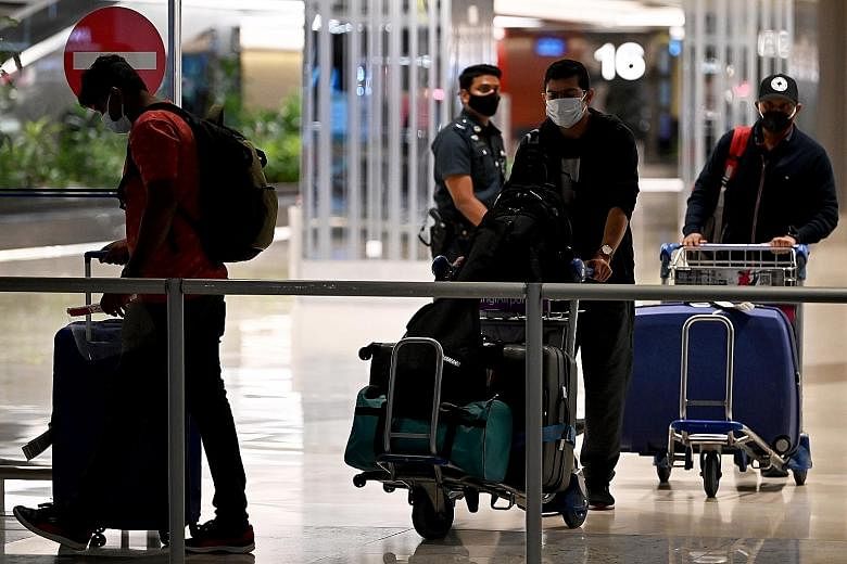 Passengers arriving at Changi Airport Terminal 1 in November. The White Paper, titled Restarting International Air Travel Within Asean, says allowing the restart of quarantine-free regional tourism is the most effective next step that governments can