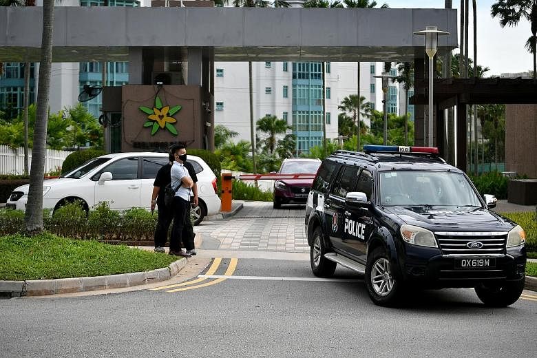 A police vehicle leaving Edelweiss Park in Flora Road on Dec 11. A teenage boy is accused of murdering his 49-year-old father, who was found injured and motionless at a unit in the condominium and later died in hospital.
