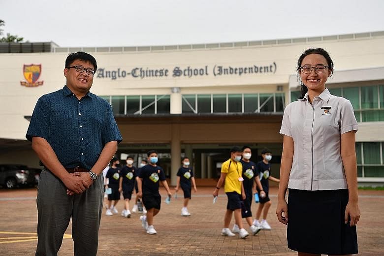 Mr Jarett Kan, director of affective curriculum at Anglo-Chinese School (Independent), with ACS(I) graduate Lauren Tse, who says the International Baccalaureate Diploma Programme pushed many students out of their comfort zones when they had to come u