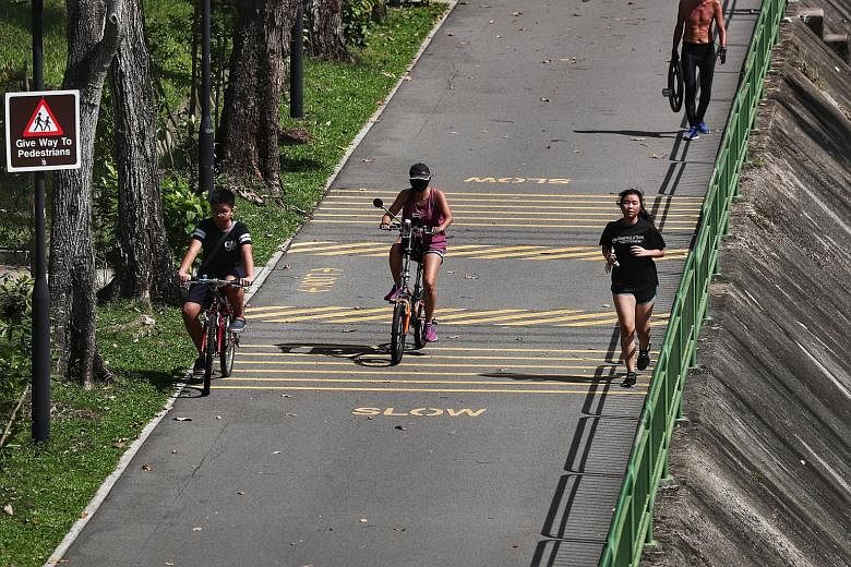 The writer says that the majority of PCN routes are made either of concrete or asphalt, which are not the most ideal surfaces for running as they cause more stress on the feet and legs. ST PHOTO: KELVIN CHNG
