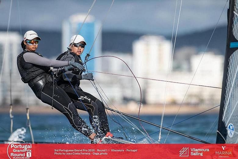 Asian Games champs Cecilia Low (left) and Kimberly Lim competing in the Portuguese Grand Prix last year in Vilamoura, Portugal. PHOTO: COURTESY OF JOAO COSTA FERREIRA