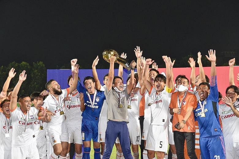 Albirex Niigata celebrating after winning their fourth Singapore Premier League title last month. But they face the prospect of just a week's training if next season's start is not delayed. ST FILE PHOTO
