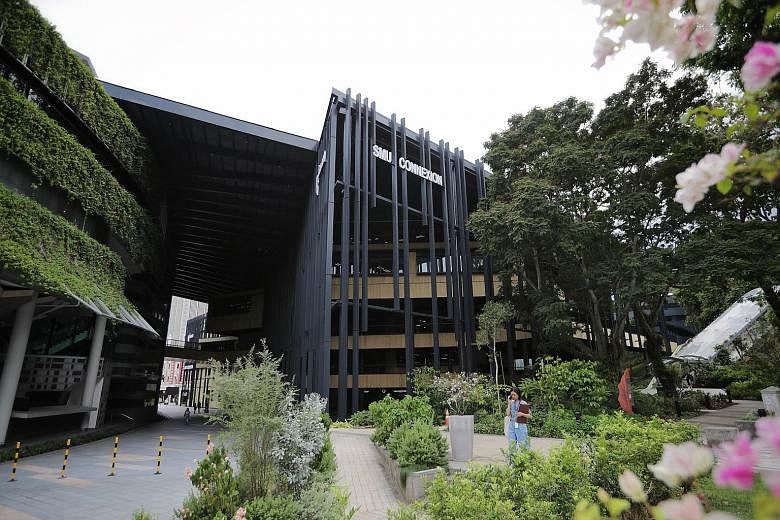 A photo of the Singapore Management University's Connexion building taken in March last year. Singapore's six autonomous universities offered around 1,000 extra places last year, taking in 17,500 Singaporeans. ST FILE PHOTO