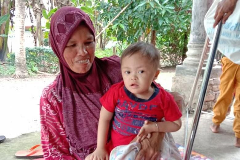 Ms Eva Murni and her three-year-old son Muhammad Rahman Naldi, who is stunted. After years of progress in curbing the scourge, Indonesia faces a resurgence of the health problem because of the Covid-19 pandemic.