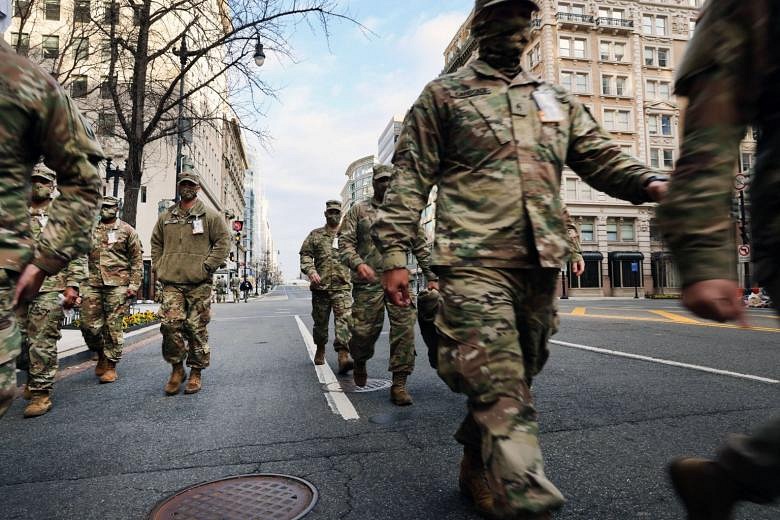 Dozen US National Guard members removed from Biden inauguration duty ...