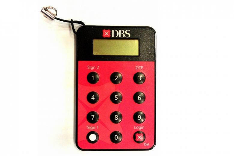 DBS Bank will stop issuing physical tokens on Feb 1, and customers can no longer use them to access mobile and digital banking services from April 1. PHOTO: DBS BANK