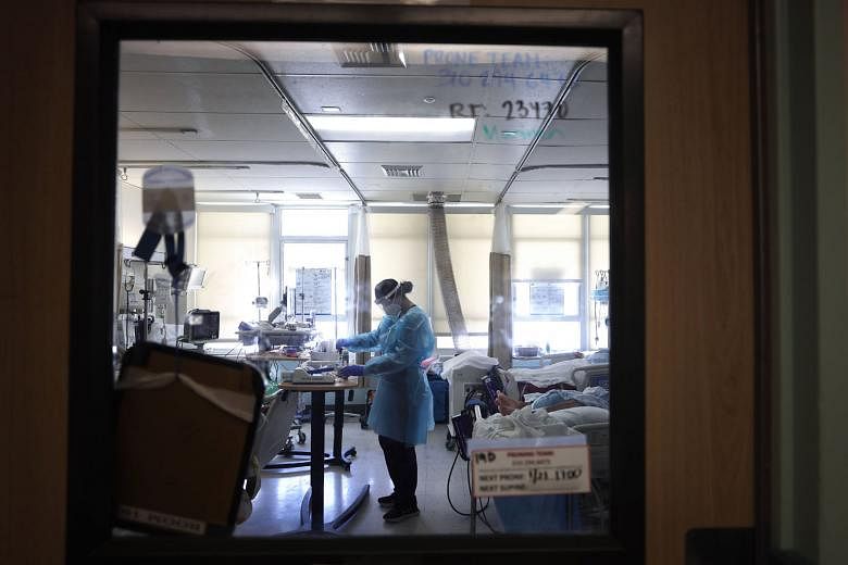 Covid-19 patients in a makeshift intensive care unit in a hospital in Torrance, California, on Thursday. President Joe Biden's administration will act to mobilise more medical teams to get shots in people's arms and to increase vaccine supply, but ma