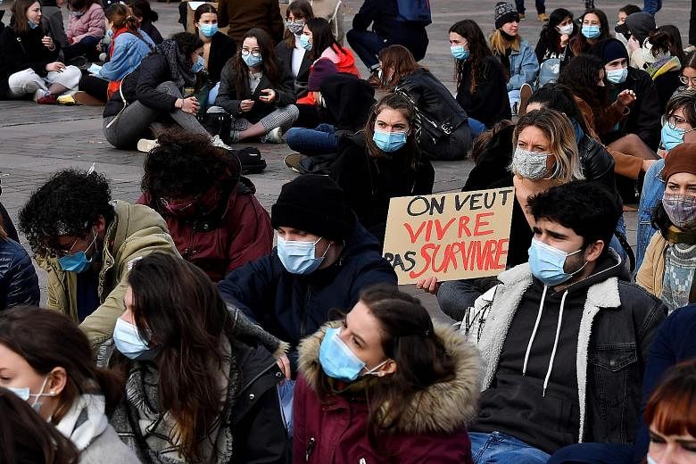 University of Toulouse students gathering with a placard reading "We want to live not survive" during a protest last Thursday to demand the resumption of on-site classes, currently held via distance learning due to Covid-19 restrictions. The pandemic