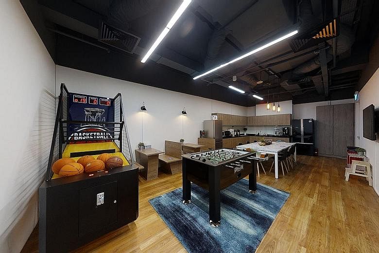 Digital marketing firm First Page Digital’s newly renovated office in Robinson Road includes a recreation area with a basketball arcade machine, as well as more meeting rooms and areas for discussions. 