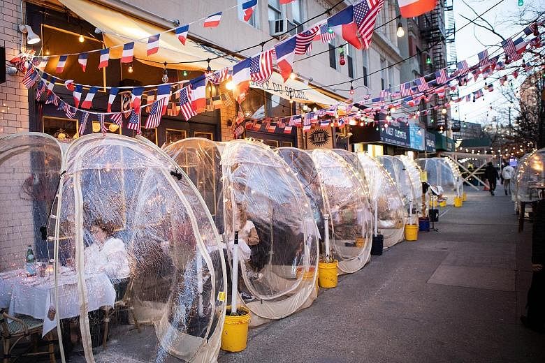 SPACE-Y EATS: Enclosed pods at casual French eatery Cafe du Soleil on the Upper West Side of Manhattan are also used for outdoor dining.