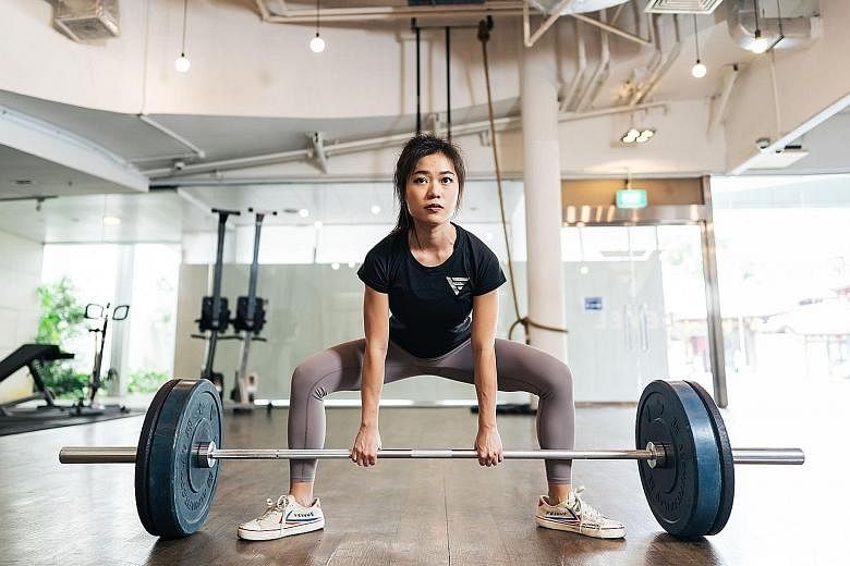 Ms Sharlynn Ooi fought off depression and eating disorders by turning to strength and fitness training.