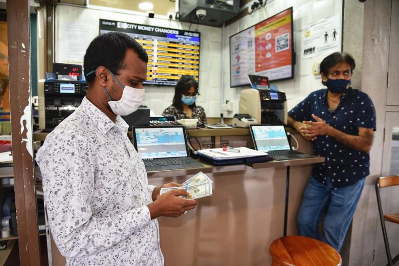 12 money changers in Singapore close as Covid19 takes toll on industry The Straits Times