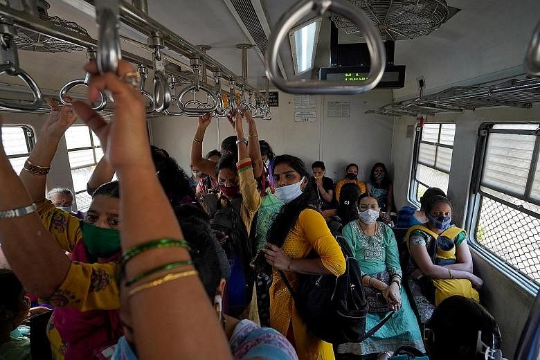 Women commuting in a suburban train in Mumbai on Monday, amid the pandemic. Sexual crimes against women are a major issue in India, which recorded 405,861 such cases in 2019, up by 7.3 per cent over 2018, according to the National Crime Records Burea
